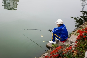 A man fishes in Truc Bach Lake. Let's hope it's catch-and-release; Hanoi's waters are incredibly polluted.